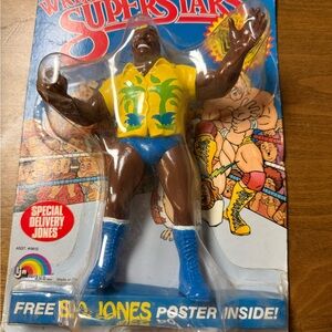WWF SD Jones. Wrestling Superstar Action Figure with Blue and Yellow Outfit